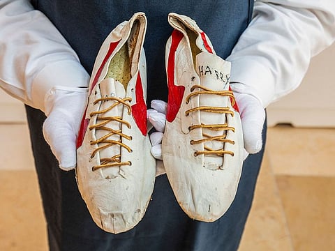 This handout photo released by Sotheby's auctioneers shows a pair of ‘prototype logo’ track spikes running shoes handmade by Nike co-founder Bill Bowerman for Canadian Track and Field sprinter and Olympian Harry Jerome in the 1960s and modified by Bowerman in the early 1970s, displayed prior to auction in New York.