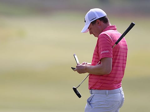 Matt Fitzpatrick with have one on the clock during the fourth round in North Berwick