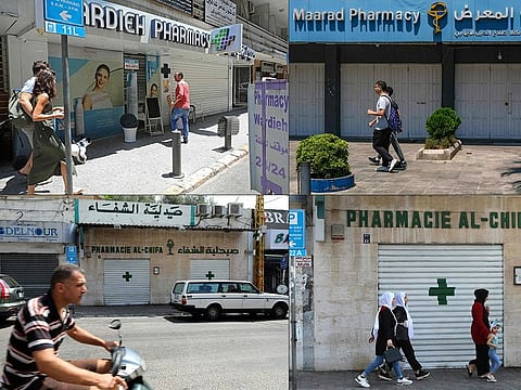 Shuttered doors of pharmacies in Lebanon during a nationwide strike to protest against a severe shortage of medicine, on July 9, 2021. Drug importers warned that they were running out of hundreds of drugs, and that the central bank had failed to pay suppliers abroad millions of dollars in accumulated dues under a subsidy scheme.