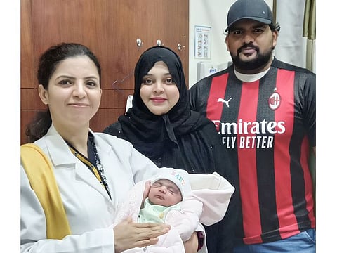 Dr. Bushra Gul with the patient Syeda Fariya, her husband and the baby.