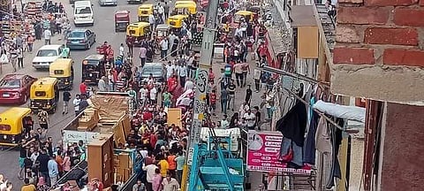 The site of the accident where a portion of the crane is visible.