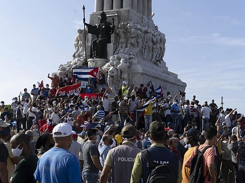 Anti-government protesters gather at the Maximo Gomez monument in Havana, Cuba, on July 11, 2021.