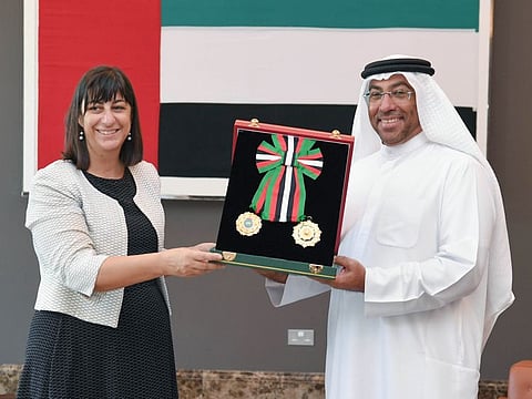 Ahmed Ali Al Sayegh, UAE Minister of State, presented the medal to Elisabeth Cardoso during their meeting at the Ministry of Foreign Affairs and International Cooperation in Abu Dhabi today.