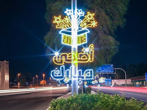 Streets in Abu Dhabi are being decked up with glittering light arrangements and slaughterhouses have prepped areas to welcome thousands of residents over the holidays.