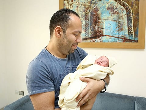 Baby Danial, seen with father Ramez Nabil Mounir, arrived at the Burjeel Hospital, Abu Dhabi at 12.01am today.