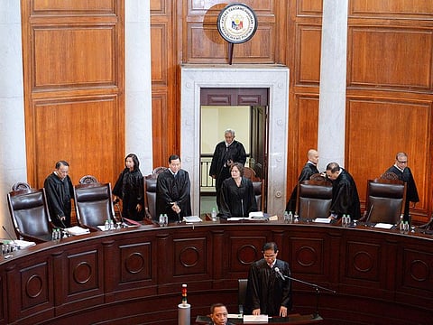 Members of the Supreme Court of the Philippines arrive to hear oral arguments on the petition to quit the International Criminal Court, at the Supreme Court in Manila. (File photo)