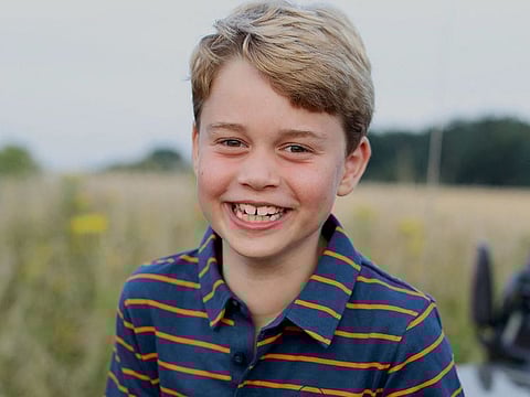 This undated handout photograph taken by Britain's Catherine, Duchess of Cambridge and released by Kensington Palace on July 21, 2021, shows Britain's Prince George of Cambridge, whose eighth birthday is on July 22, 2021, in Norfolk earlier this month.