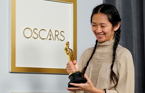 Director/producer Chloe Zhao, winner of the award for best picture for "Nomadland," poses at the press room of the Oscars, in the 93rd Academy Awards in Los Angeles, California, U.S., April 25, 2021.