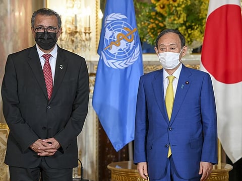 Yoshihide Suga, Japan's Prime Minister (right) and Tedros Adhanom Ghebreyesus, Director General of the World Health Organization (WHO), meet at the Akasaka State Guest House in Tokyo on Thursday. Suga is scheduled to be at the opening ceremony of the Tokyo 2020 Olympics, alongside US First Lady Jill Biden, and French President Emmanuel Macron.