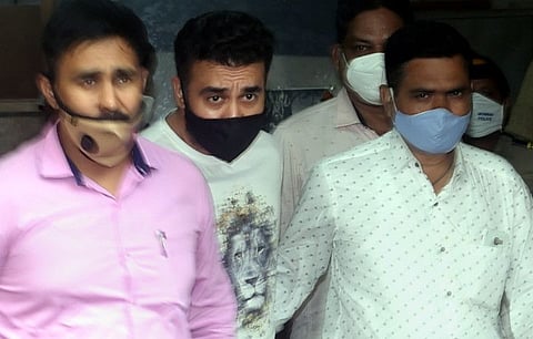 Raj Kundra (C) being taken to the Esplanade Court as he was arrested in the pornography-related case Mumbai, Friday, July 23, 2021.