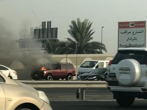 The car on fire at Al Khail road in Dubai.