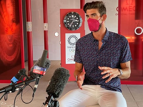 US Olympic gold medalist Michael Phelps speaks during an interview with journalists on the sidelines of the Olympic Games in Tokyo.