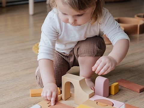 At three, toddlers can not only speak in short sentences but also express a wider range of emotions. Picture used for illustrative purposes only