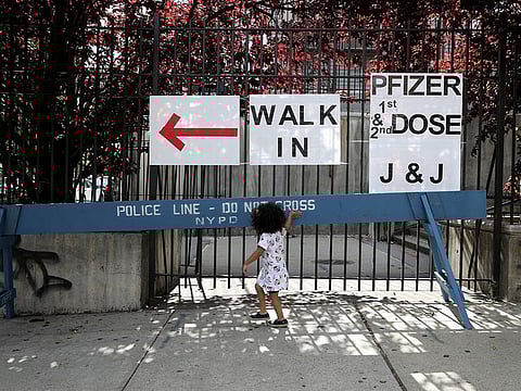 A child outside a vaccination site at Medgar Evers College in Brooklyn.