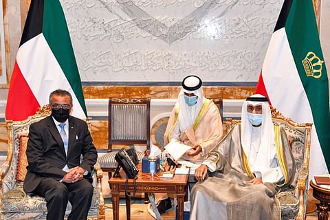 A photo provided by the Kuwaiti news agency Kuna on July 28, 2021 shows Kuwait's Emir Sheikh Nawaf Al Ahmad Al Jaber Al Sabah receiving the Director General of the World Health Organization (WHO) Tedros Adhanom Ghebreyesus at Bayan Palace in Kuwait City.