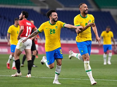 Brazil's Matheus Cunha (right) celebrates after his strike against Egypt during their men's quarter final in Saitama, Japan.