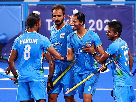 Dilpreet Singh of India celebrates after defeating Great Britain