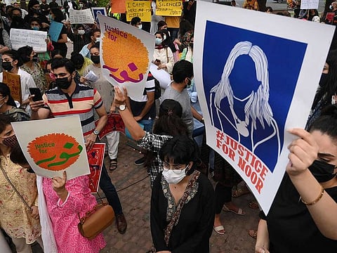 Women's rights activists hold placards during a demonstration in Lahore on July 24, 2021, against the brutal killing of Noor Mukadam, the daughter of former Pakistan envoy to South Korea, in the federal capital.