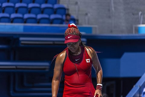 Naomi Osaka, of Japan, was expected to win gold in the singles tennis event but she was knocked out in the third round. It is one of several big surprises during the Tokyo Olympics.