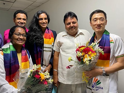 PV Sindhu and her Korean coach Park Tae-sang (right) was received by Ajay Singhania (second right), Secretary of Badminton Federation of India (BAI) on her arrival from Tokyo Olympics with the bronze medal in New Delhi on Tuesday.