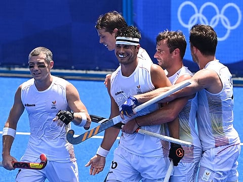 Belgium's hat-trick man Alexander Robby Hendrickx (centre) celebrates with teammates after scoring against India during their men's semi-final match of the Tokyo 2020 Olympic Games at the Oi Hockey Stadium in Tokyo on Tuesday.