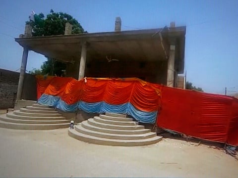 This image from a video, shows a Hindu temple cordoned-off on August 5 by local authorities after it was stormed by a mob a day earlier, in Bhong, in Rahim Yar Khan district.
