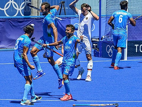 Indian players celebrate after defeating Germany 5-4 in the men's field hockey bronze medal match, at the 2020 Summer Olympics, in Tokyo, on August 5, 2021.