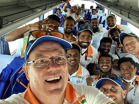 Selfie-time: Graham Reid, Indian hockey team's Chief Coach, with the bronze medal winning team in the team bus.