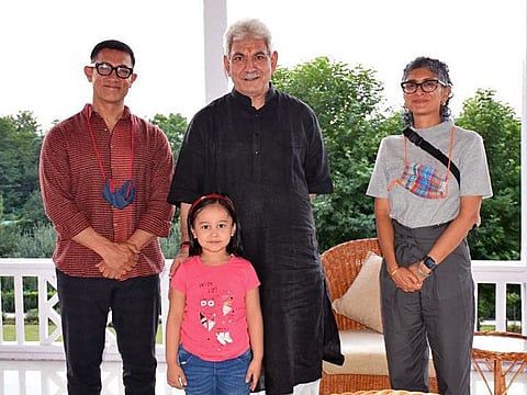Jammu and Kashmir Lieutenant Governor Manoj Sinha meets Bollywood actor Aamir Khan and producer-director Kiran Rao, at Raj Bhavan, in Jammu on July 31.