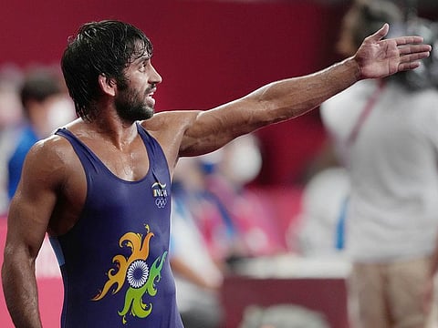 India's Bajrang Punia reacts after his bout against Haji Aliyev of Azerbaijan in the semi-finals of their men's freestyle 65kg wrestling match at the 2020 Olympics on Friday.