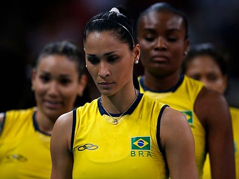 Brazil's Tandara Caixeta, seen on the left of Jaqueline Carvalho, says the drug Ostarina was accidentally introduced into her system.