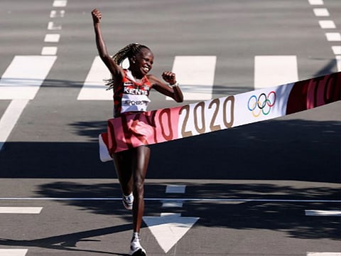 Peres Jepchirchir of Kenya celebrates after winning gold.