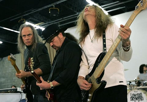 Members of Lynyrd Skynyrd, from left, Rickey Medlocke, Gary Rossington and Ean Evans, practice at the Jacksonville Production Studio in Jacksonville, Fla., Friday, Feb. 4, 2005, for their Saturday performance as part of the Super Bowl concert series. (AP Photo/Ann Heisenfelt)