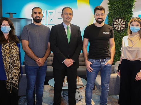 Rizek and THB management during the partnership ceremony