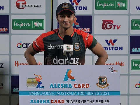 Bangladesh veteran Shakib Al Hasan receives the Player of the Series after winning the fifth and final Twenty20 International against Australia in Dhaka on Monday.