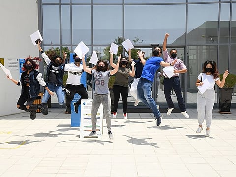 Students celebrating A-level results at GEMS Metropole School - Motor City, Dubai