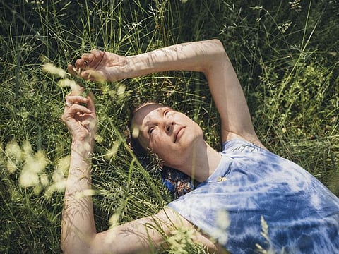 Vicky Krieps in the backyard of her family home in rural Luxembourg on June 19, 2021.