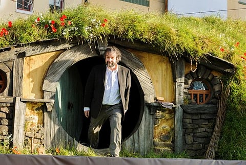 New Zealand director Peter Jackson emerges from a 'Hobbit Hole' to make an address at the world premiere of 'The Hobbit - An Unexpected Journey' in Wellington November 28, 2012.