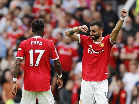 Manchester United's Bruno Fernandes celebrates scoring their fourth goal to complete his hat-trick against Leeds.