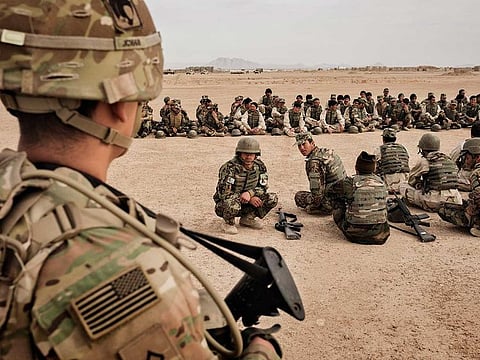 American soldiers overseeing training of their Afghan counterparts at Camp Bastion in Helmand Province, Afghanistan, March 22, 2016.