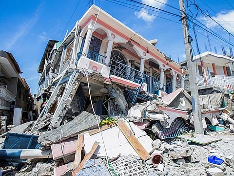 A view shows houses destroyed following a 7.2 magnitude earthquake in Les Cayes, Haiti August 14, 2021.