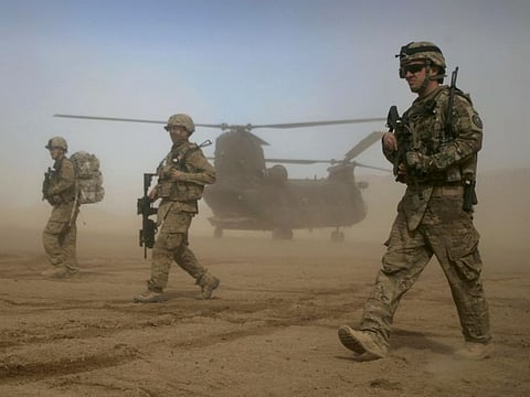 American soldiers, part of the Nato- led International Security Assistance Force (ISAF), patrol west of Kabul, in this January 28, 2012 file photo.