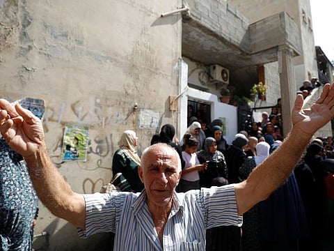 A mourner reacts during the funeral of Palestinian Saleh Ammar, who was killed with others by Israeli forces during clashes at an Israeli raid, according to a local official, in Jenin.