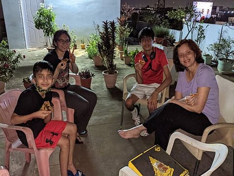 Riya Sabherwal, the humanities group topper, with 99 per cent marks, with her family.