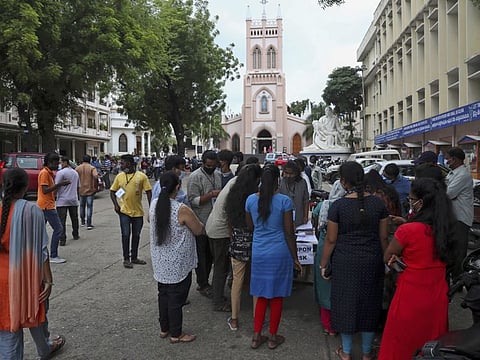 People enrol to receive the Covishield and Covaxin vaccine during a special vaccination drive at Saint Mary’s Basilica in Hyderabad on August 19, 2021.