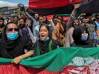 Pictures: Afghan protests spread in early challenge to Taliban