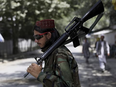A Taliban fighter stands guard at a checkpoint in the Wazir Akbar Khan neighbourhood in Kabul. The chaos in Kabul and his own conflicting messages have left President Joe Biden struggling to assert command over world events and seemingly more intent on washing his hands of Afghanistan than expressing concern over the humanitarian tragedy unfolding on the ground.