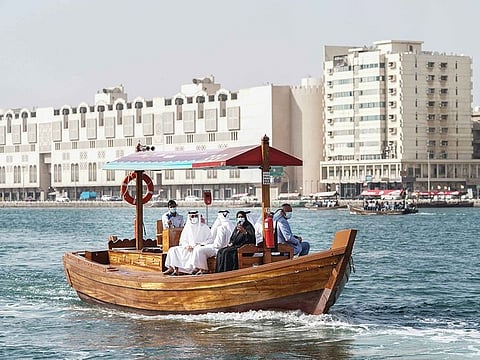 The wooden abra is a popular choice for riders crossing Dubai Creek.