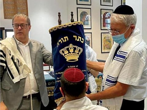Bahraini Jews return to the Shabbat prayers in Manama's synagogue.