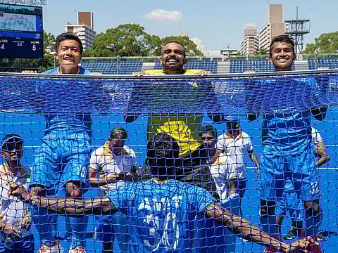 Raising the bar: Vivek Sagar Prasad (right) with Indian hockey team's talismanic skipper P.R.Sreejesh and Nilakanta after winning the bronze medal play-off match against Germany in Tokyo Olympics.